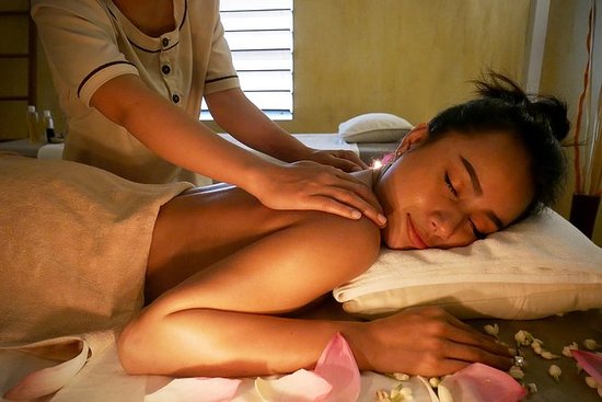 Woman gets traditional Khmer massage in Siem Reap, Cambodia